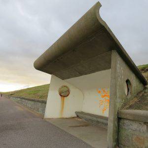 futuristic shelters line the beach